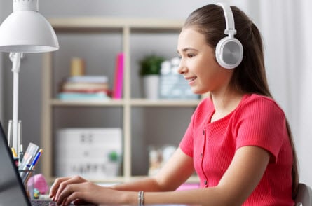 Girl typing on laptop Girl typing on laptop